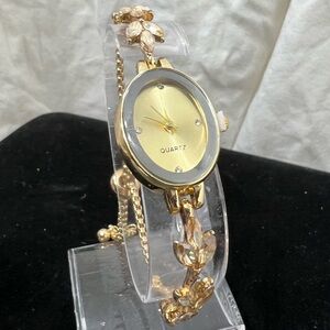Quartz Lady Watch W/ Gold Face And Rhinestone Chain. Has Crystals On Inside Face